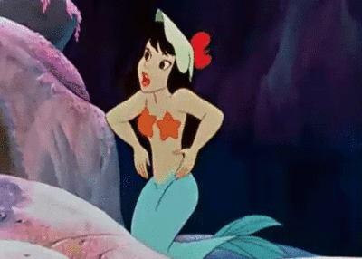 gif of a black haired mermaid from peter pan with hands on hips